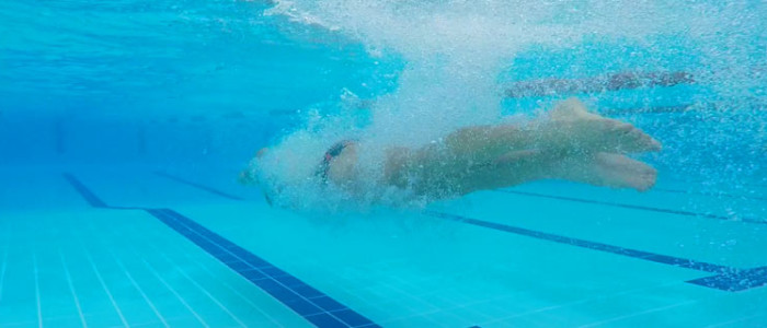 Jake Packard swimming underwater